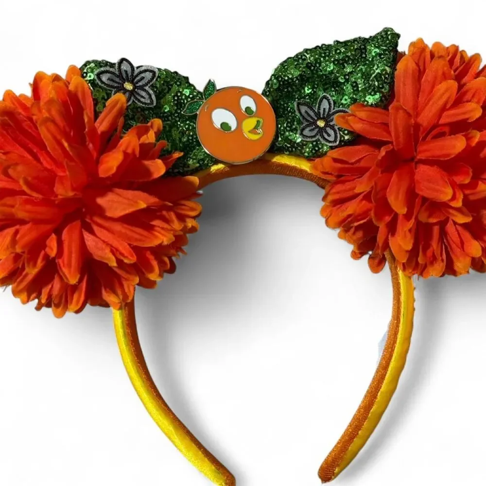 Disney Parks Disney world orange bird headband with orange pom-poms